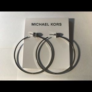 Michael Kors silver hoop earrings.